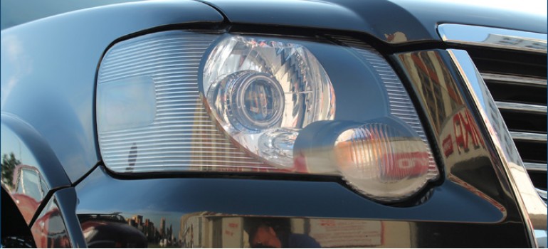 Установка биксеноновых линз и покраска внутренностей фар в черный матовый цвет на Форде Эксплорере ( Ford Explorer )